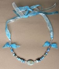 Larimar Necklace on blue and cream ribbon